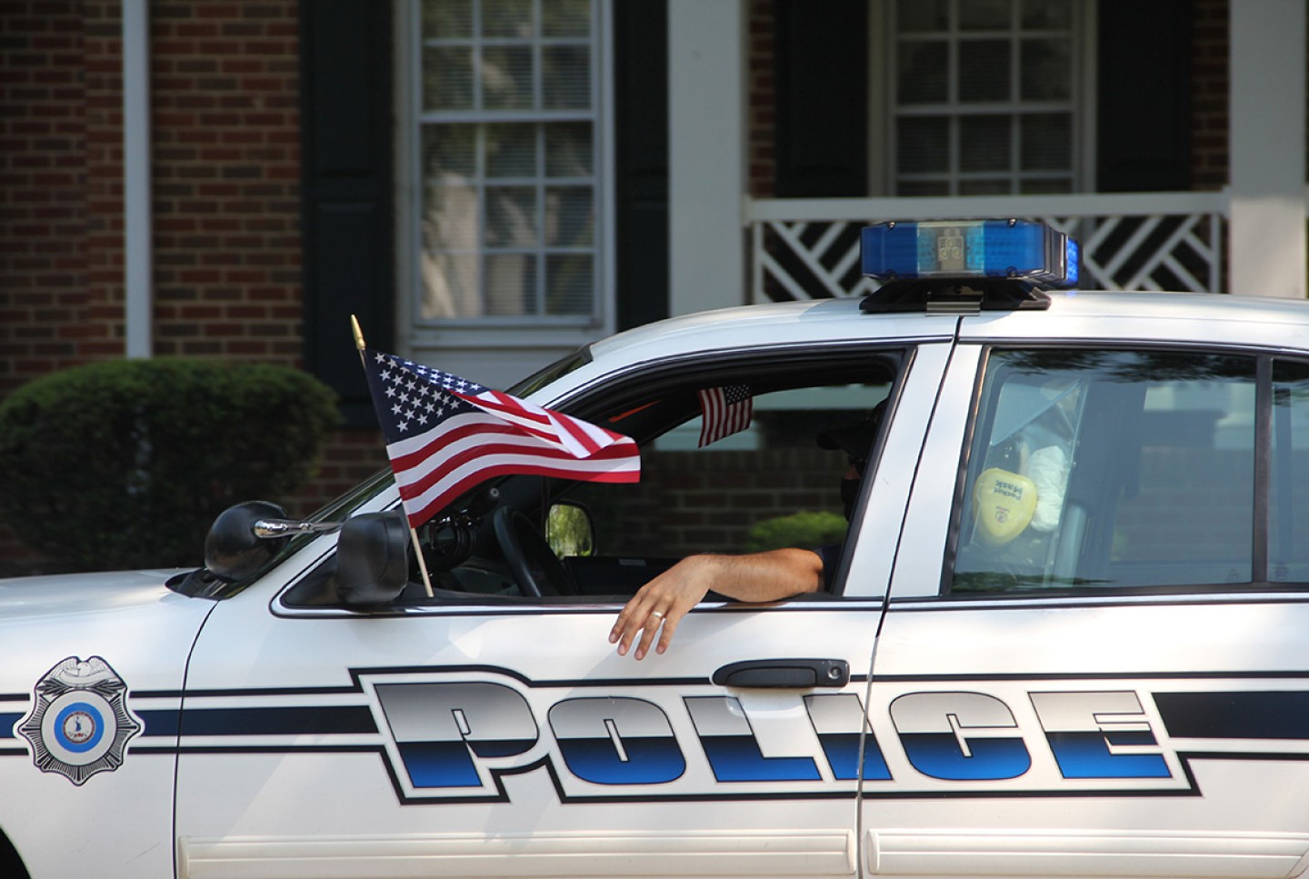 police-car-with-the-united-states-flag-during-a-ju-2021-09-03-19-52-08-utc